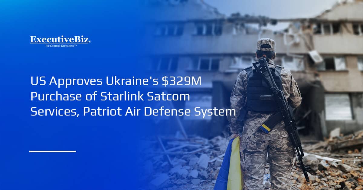 A warfighter holding the Ukrainian flag. Ukraine will purchase satcom services and defense system sustainment support
