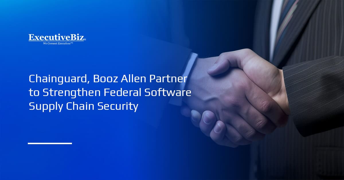 Handshake showing partnership. Chainguard has partnered with Booz Allen Hamilton to advance software supply chain security.